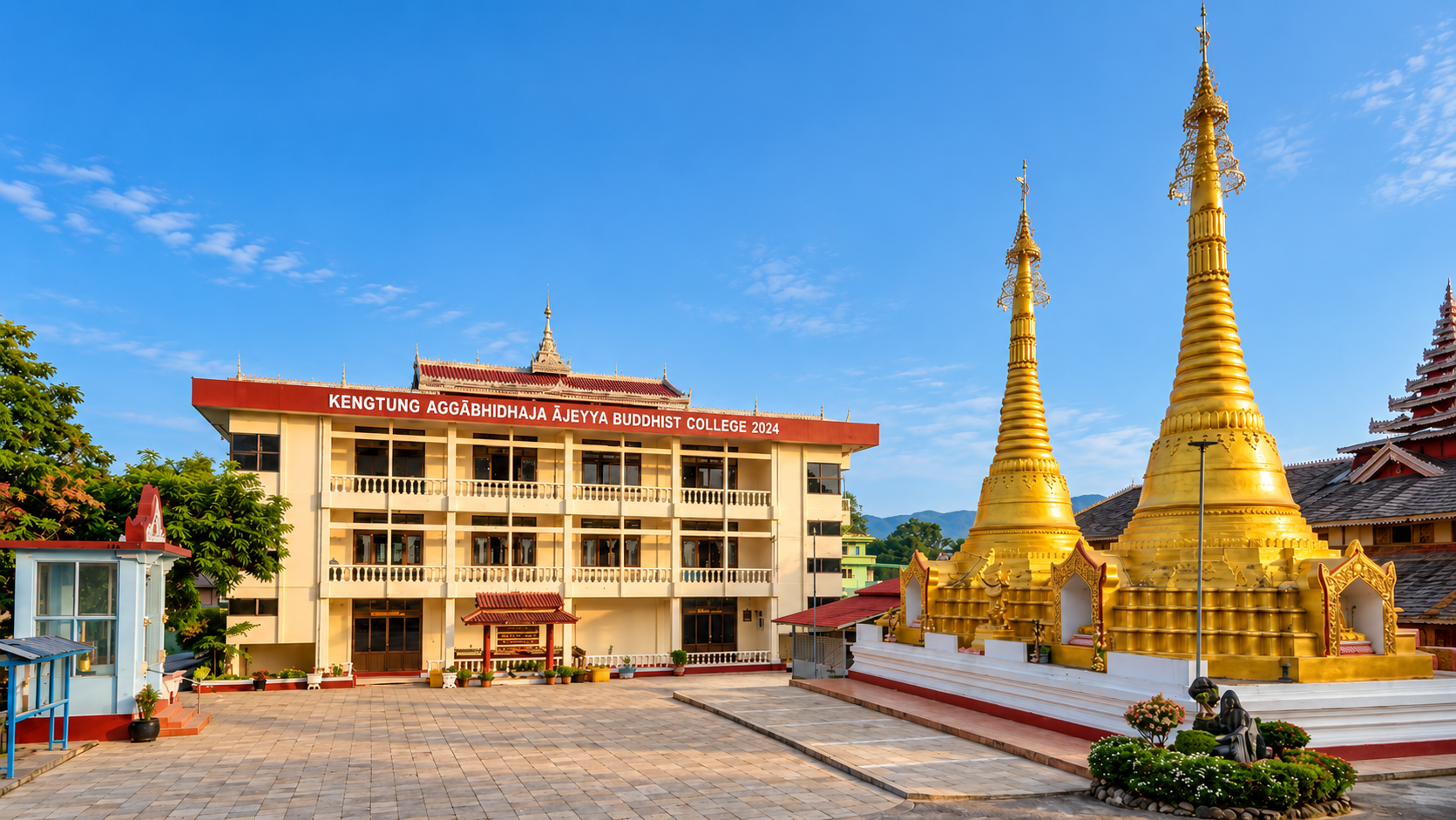 Golden stupas and Dhammodaya monastery courtyard in Kengtung